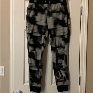 Black and gray Nike sweatpants for men